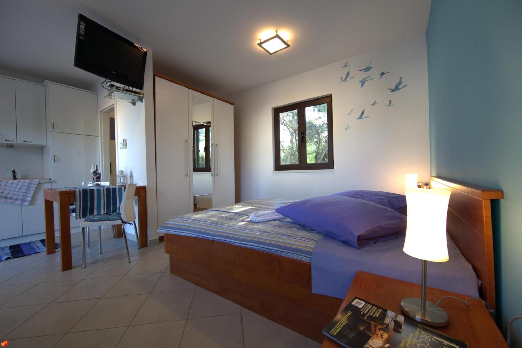 The Sea House Apartments Vis Phòng bức ảnh
